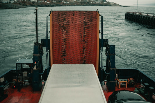 red and black metal frame on white boat