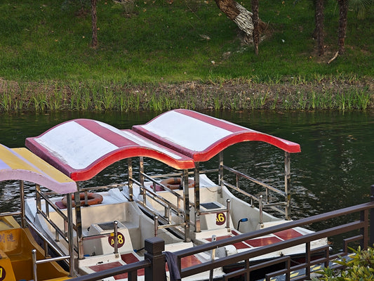 a couple of boats that are sitting in the water